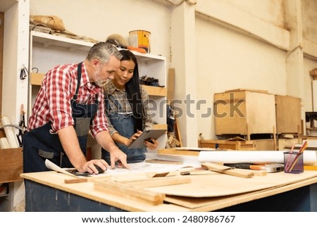 Similar – Image, Stock Photo Senior male woodworker working in garage