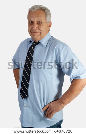 Portrait of senior caucasian man with grey hair wearing shirt and tie with arms on waist