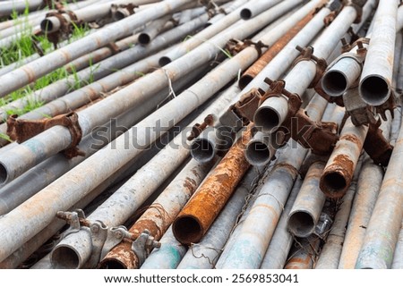 Similar – Image, Stock Photo Stacked up, rusty metal barrels are reflected in puddle