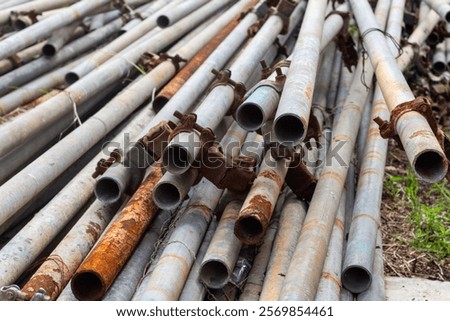 Similar – Image, Stock Photo Stacked up, rusty metal barrels are reflected in puddle
