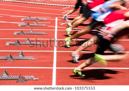 sprint start in track and field in blurred motion