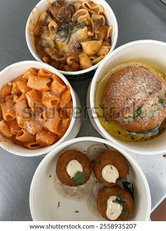 Similar – Image, Stock Photo South italian  pasta orecchiette with tomato sauce and cacioricotta cheese