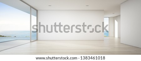 Sea view empty large living room of luxury summer beach house with swimming pool near wooden terrace. Big white wall background in vacation home or holiday villa. Hotel interior 3d illustration. Сток-фото © 