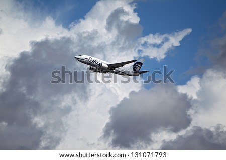 LOS ANGELES, CALIFORNIA, USA - MARCH 8, 2013. Alaska Airlines Boeing 737-790 takes off from Los Angeles Airport on March 8, 2013. The plane has a range of 6,340 miles with 177 seats.