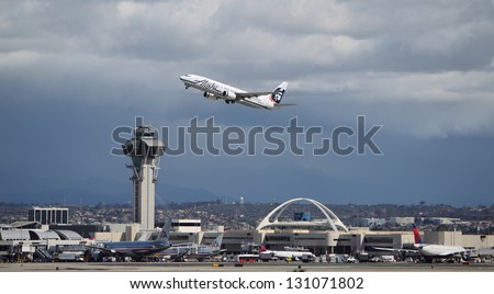 LOS ANGELES, CALIFORNIA, USA - MARCH 8, 2013 - Alaska Airlines Boeing 737-890 takes off from Los Angeles Airport on March 8, 2013. The plane has a range of 5,765 km with 160 seats.