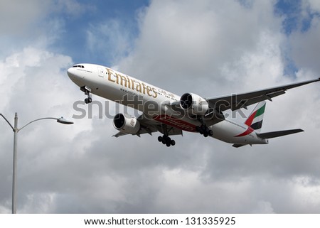 LOS ANGELES, CALIFORNIA, USA - MARCH 8, :  Emirates Boeing 777-31HER lands at Los Angeles Airport on March 8, 2013. The plane has the most powerful jet engines in commercial service
