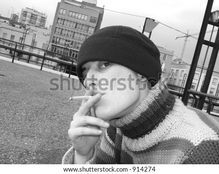 smoking woman in cold city