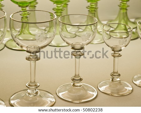 Glassware royal court of Augsburg. Crystal glasses in different colors with the royal coat of arms carved