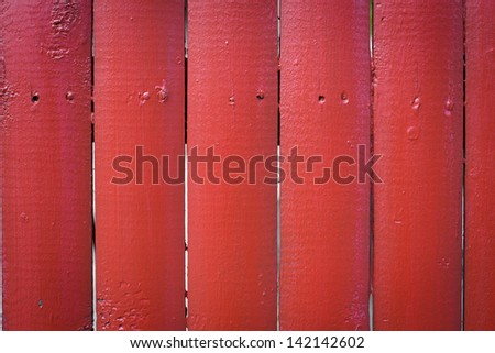 Red wooden fence close up background shot