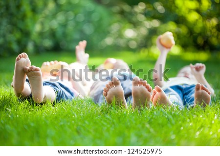 Family Playing On Green Grass In Spring Park Stock Photo 124525975 ...