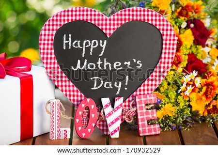 Beautiful bouquet of flowers against green background. Spring family holiday concept. Mother`s day