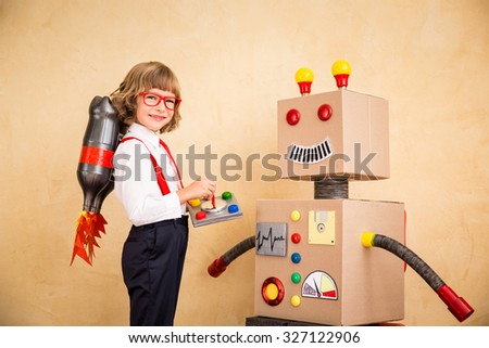 Portrait of young businessman with jet pack and robot. Success, creative and innovation technology concept. Copy space for your text