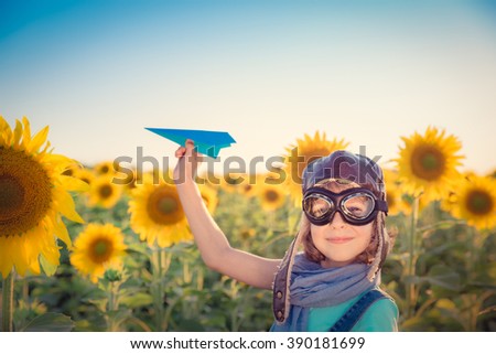 Similar – Foto Bild chica sujetando girasoles en el balcon