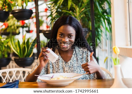 Similar – Image, Stock Photo Woman seasoning food with salt