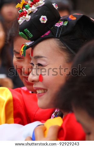YONGIN - APRIL 18: A performance of the Traditional Wedding at Korean Folk Village on April 18, 2010 in Yongin, South Korea. Korean Folk Village is a living museum type of tourist attraction.