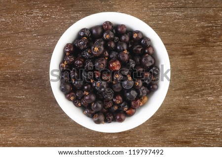 Juniper berries in  white bowl