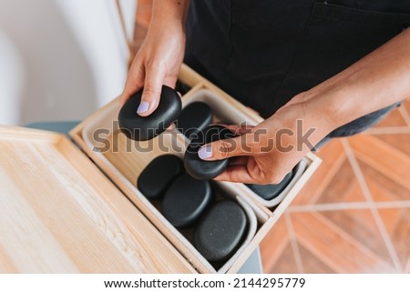 Similar – Image, Stock Photo Woman paining wooden box in blue color with brush