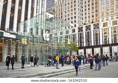 NEW YORK - OCTOBER 29: The Apple Store on 5th Avenue on October 29 2013 in New York City. The 5th Ave Apple Store is the flagship subterranean location in New York City.