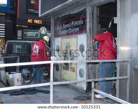 Emergency operations workers clean up evidence after the Times Square bombing on March 6th 2008.