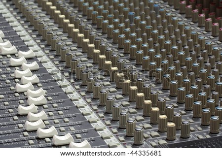 An audio mixer is an electronic device that channels incoming audio signals while maintaining control over such effects as volume level, tonality, placement, and other dynamics for music production