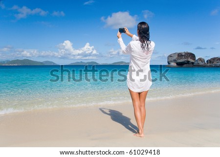 Similar – Image, Stock Photo Female tourist taking shot of sea in twilight