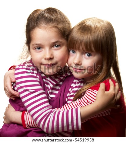 Two Little Girlfriends One Hugs Another Isolated Over White Background ...