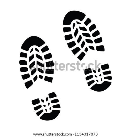 A black and white silhouette of some boot prints