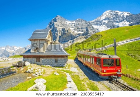 Similar – Foto Bild Roter Zug und Frühlingslandschaft bei Sonnenaufgang. Kontext der Frühjahrsreisen