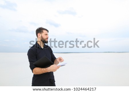 Similar – Image, Stock Photo Bearded male on deserted road