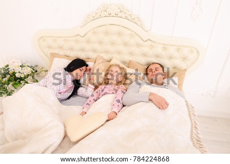 Cute Couple Lying Asleep In Bed At Home In Bedroom Images