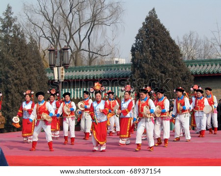 BEIJING - FEBRUARY 11: Chinese dancers perform at the Spring Festival Fair in Ditan Park in Beijing on February 11, 2005. The fair marked the beginning of the lunar New Year in China.