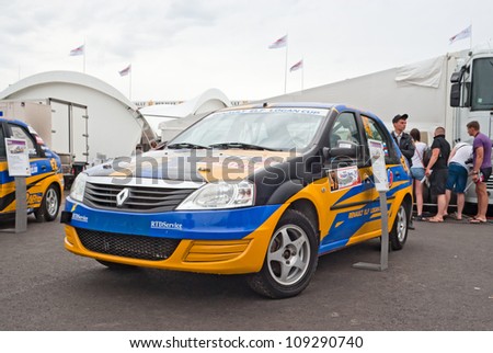 FEDYUKOVO, RUSSIA - JULY 15: Renault Logan rally car from E2 Motorsport team is displayed in the paddock of Moscow Raceway circuit on July 15, 2012 in Fedyukovo, Russia.