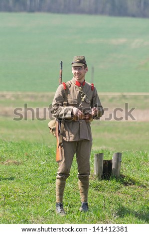 LOSHANY, BELARUS - MAY 5: a military history club member in the Imperial Japanese Army uniform stands during historical reenacting show at Stalin\'s Line memorial on May 05, 2013 in Loshany, Belarus
