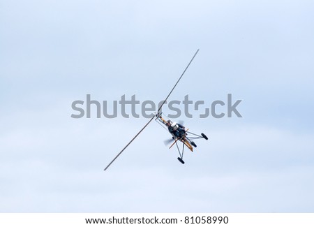 TVER, RUSSIA - JULY 09: An ultralight autogyro flies during the Tver Blue Skies aviation festival on July 09, 2011 in Tver, Russia