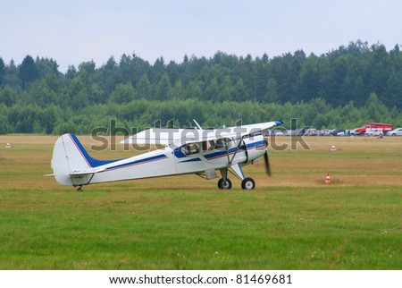 TVER, RUSSIA - JULY 09: Yak-12 plane taxis for takeoff during the Tver Blue Skies aviation festival on July 09, 2011 in Tver, Russia