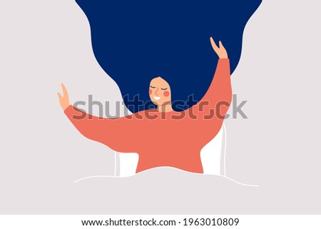 Happy girl wakes up and feels good yourself. Smile woman makes morning stretch in the bed. Body positive and health care concept. 