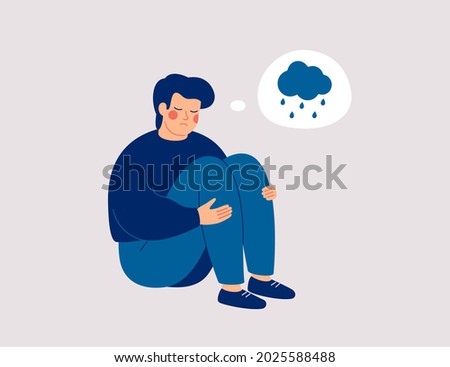 Unhappy man hugs his knees and sits on the floor with rainy cloud above his. Sad boy is crying.  Male character feels depression, sorrow, grief. Mental disorder or illness concept. Vector illustration Photo stock © 
