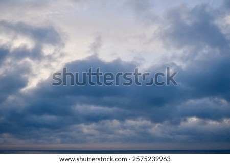 Similar – Image, Stock Photo Sunset sky over coastal city and sea