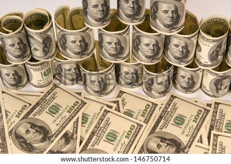 Hundred dollar bills money pile
