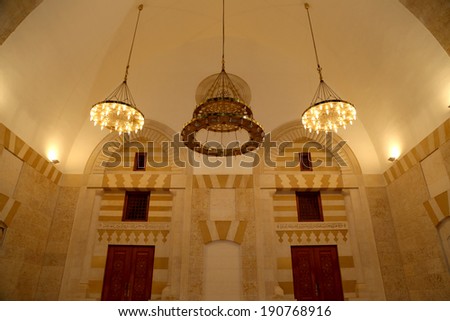 AMMAN, JORDAN - APRIL 06, 2014: King Hussein Bin Talal mosque in Amman (at night), Jordan