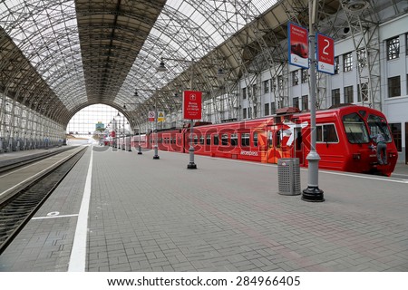 MOSCOW, RUSSIA - MAY, 14 2015: Aeroexpress red Train on Kiyevskaya railway station  (Kiyevsky railway terminal,  Kievskiy vokzal) -- is one of the nine main railway stations of Moscow, Russia