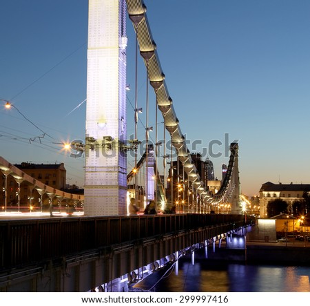 Krymsky Bridge or Crimean Bridge (night) is a steel suspension bridge in Moscow, Russia. The bridge spans the Moskva River 1,800 metres south-west from the Kremlin