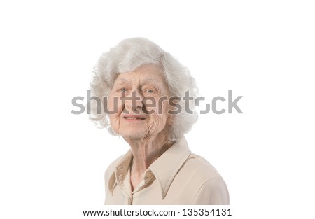 Portrait of happy elder lady. shot against white background.