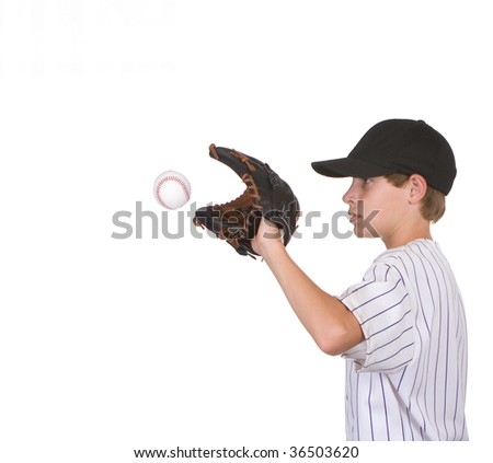 boy catching baseball