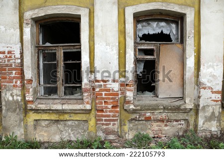 the broken windows of the old house