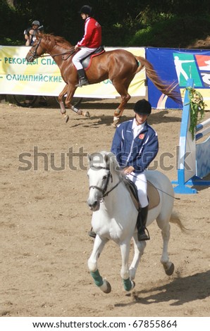 RUSSIA, MOSCOW - AUG 8: Sportsmen compete in equestrian sport \