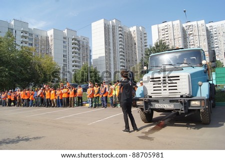 MOSCOW - AUGUST 30: The cameraman removes guest workers on \