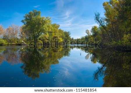 Small Ukrainian river Oril (left inflow of biggest river Dnepr) in fall season.