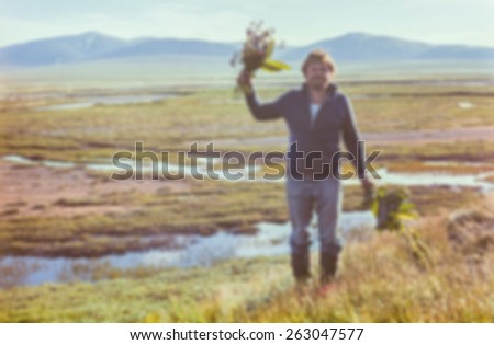 Mix of flowering tundra, beautiful summer and positive people emotion through soft blurring effect - vintage photo taken in July 1979, Chukchi Peninsula, USSR