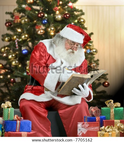 A real Santa Claus portrait checking his list
